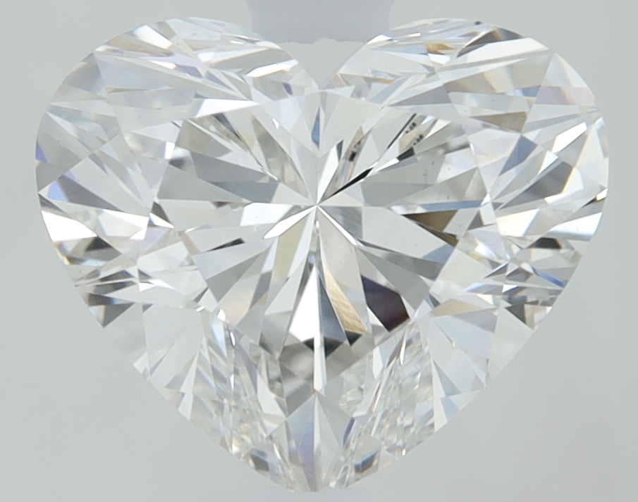 1.63ct lab-grown heart diamond with measurements 7.09mm x 8.37mm x 4.85mm, F color, VVS2 clarity.