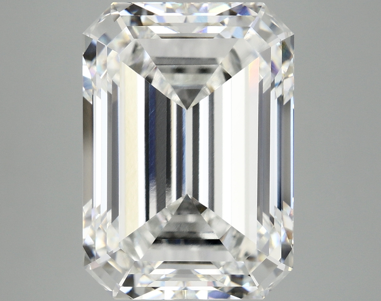 10.34ct lab-grown emerald diamond with E color, VVS2 clarity, and measurements 14.63 x 10.43 x 7.04 mm.