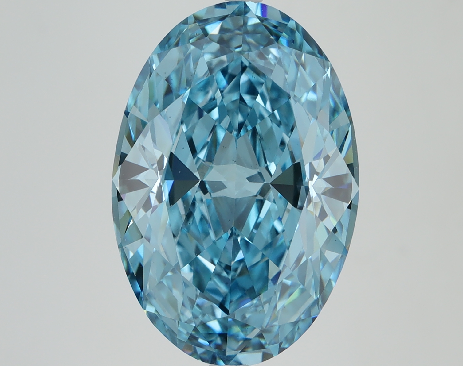 7.41ct oval lab-grown diamond, blue color, VS1 clarity, measurements 16.41mm ID