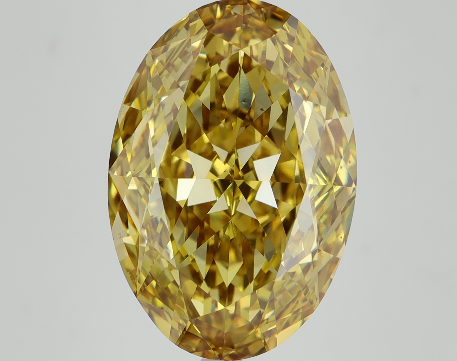 10.05ct oval lab-grown diamond, yellow color, VS1 clarity, measurements 16.93mm x 11.61mm x 6.58mm